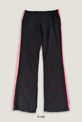 Black and pink Puma trousers front preview
