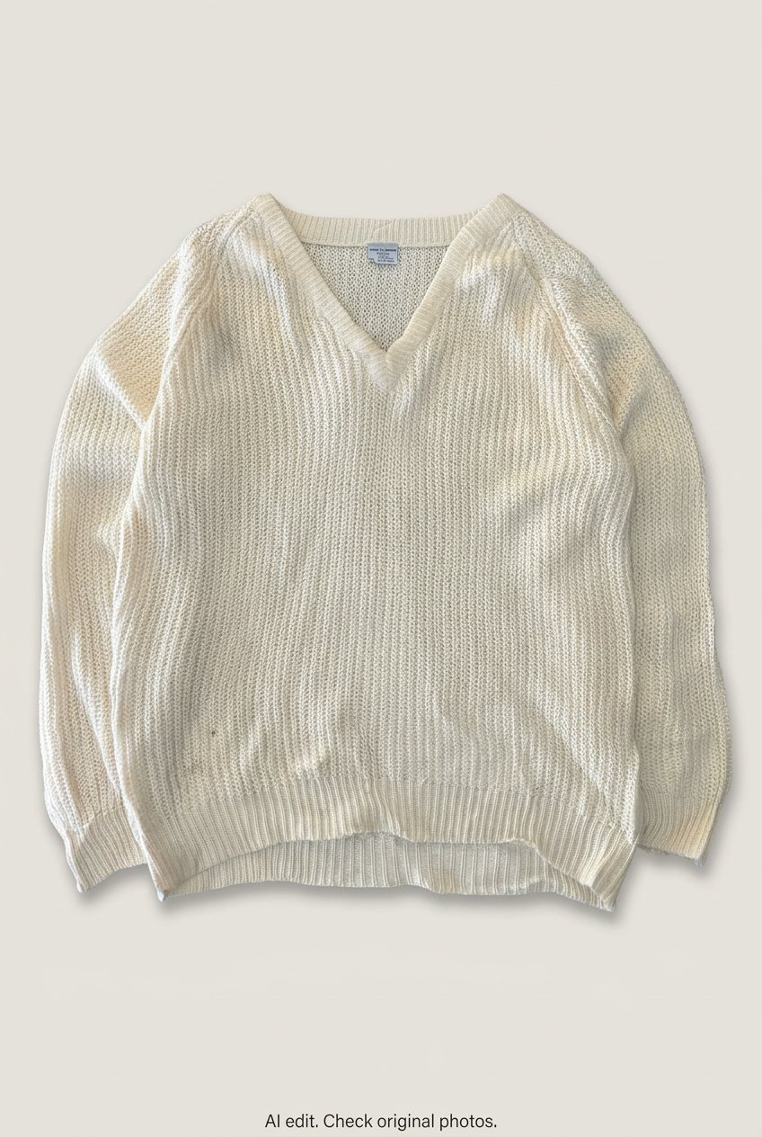 Cream V-neck sweater front preview
