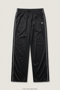 Front product view of black Reebok track pants, flat lay