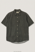 Front product view of dark printed short-sleeve shirt, flat lay