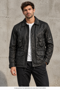 Man wearing illustrative black pocket jacket